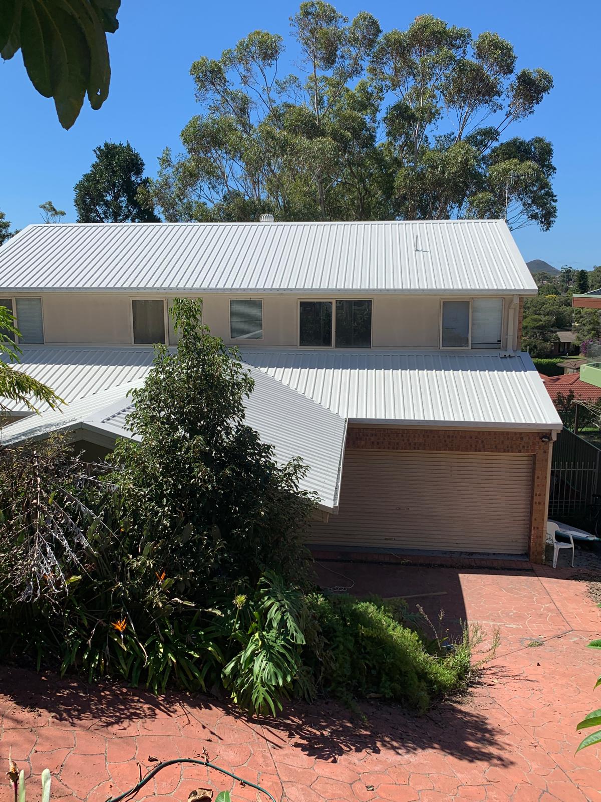 Surfmist Colorbond respray on a two-storey home