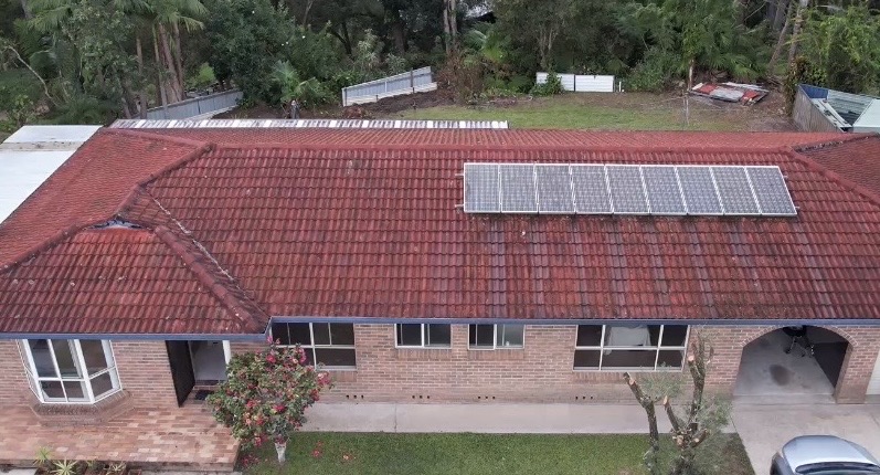 Faded cement tile roof before restoration